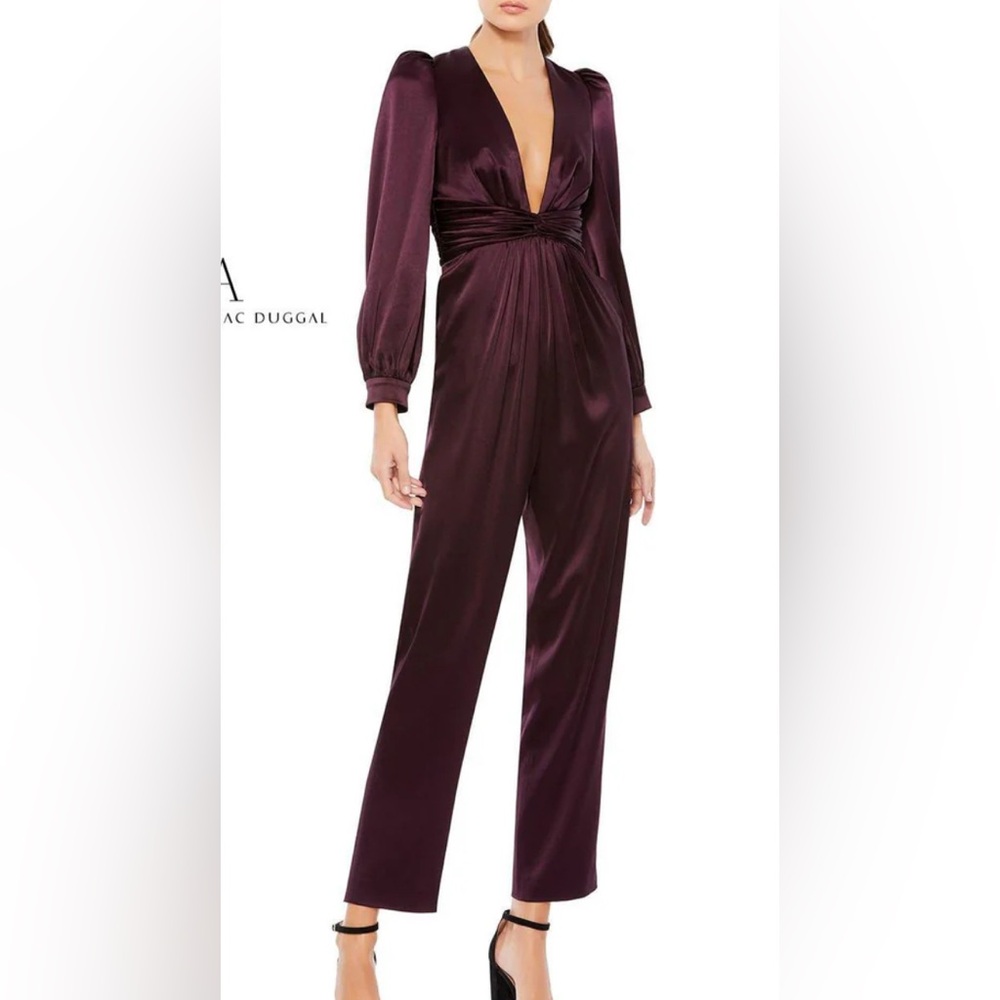 Plum colored jumpsuit from Mac duggal originally $300
Never worn
NWT